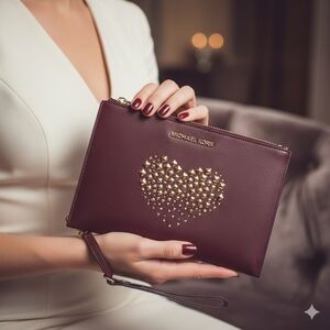 Michael Kors Maroon Wristlet with Gold Heart Design